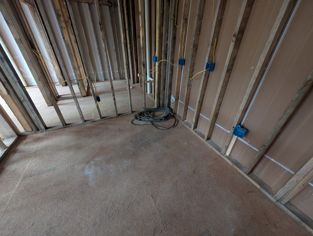 apartment interior gutted down to the studs