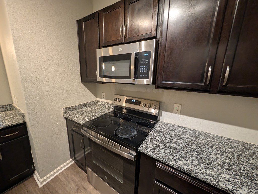 a brand new modern apartment interior with eat in kitchen