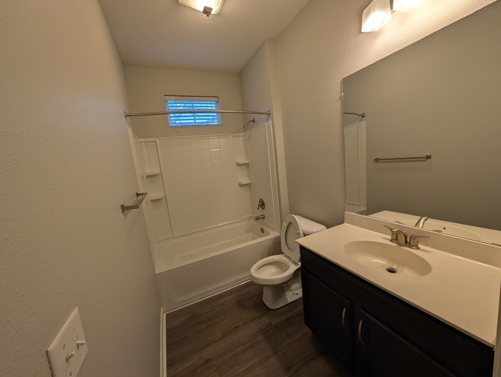 a brand new modern apartment bathroom