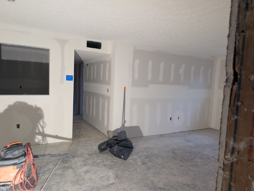 an apartment interior with new drywall