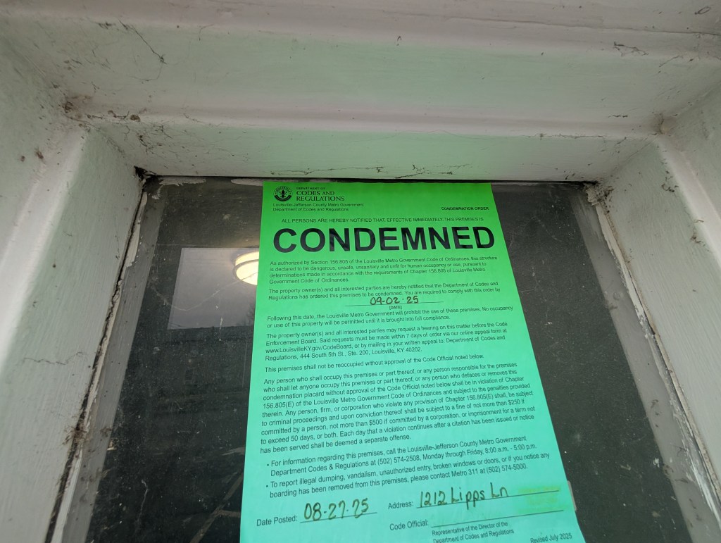 a condemned notice on an apartment door